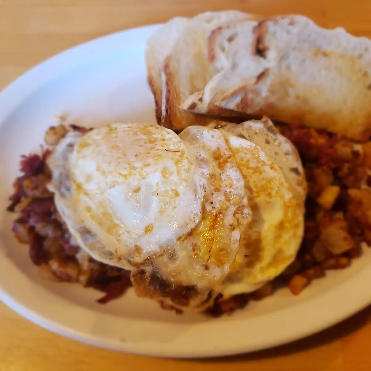 Corned Beef Hash with Eggs over Medium
