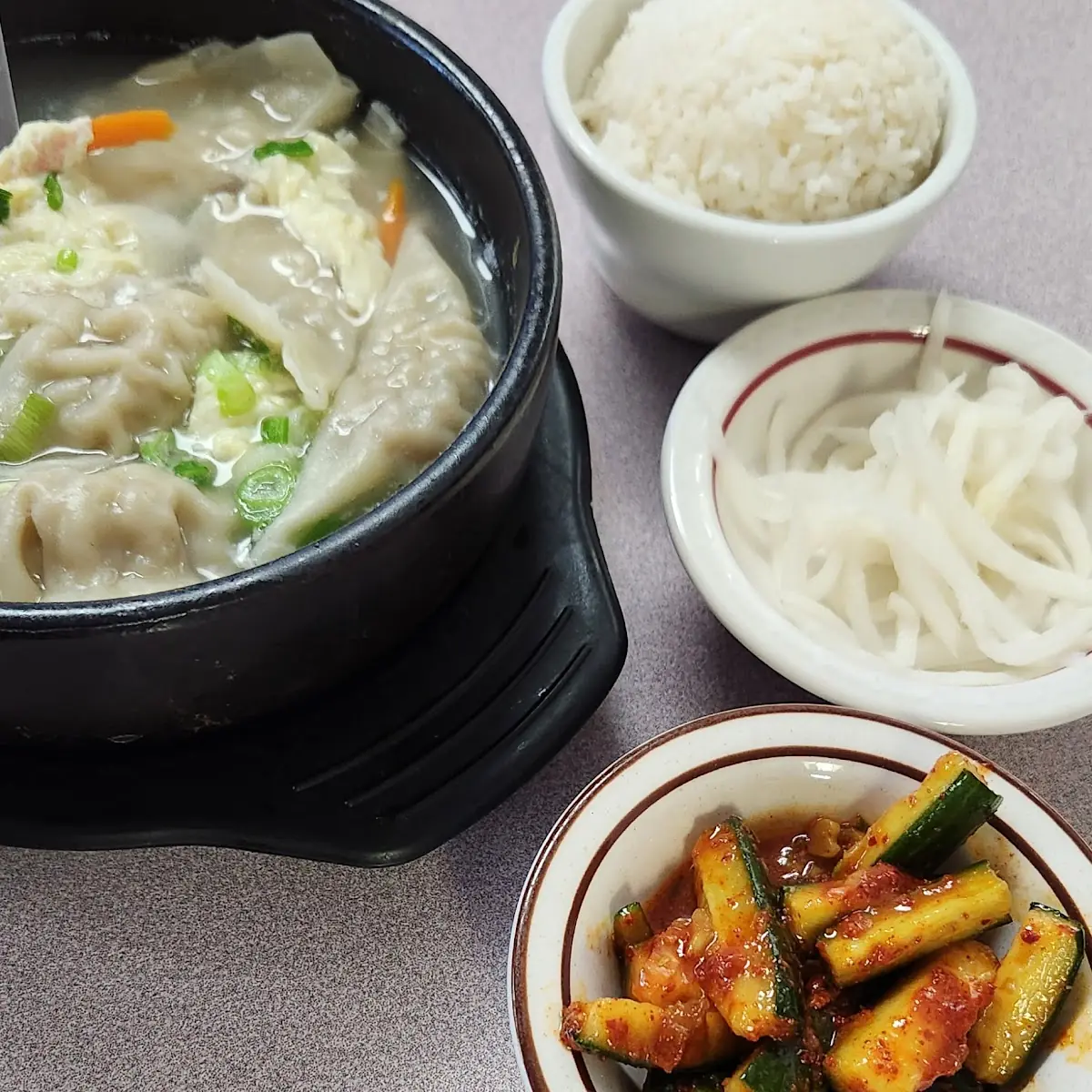 Dumpling Soup Cucumber Kimchi Pickled Radish