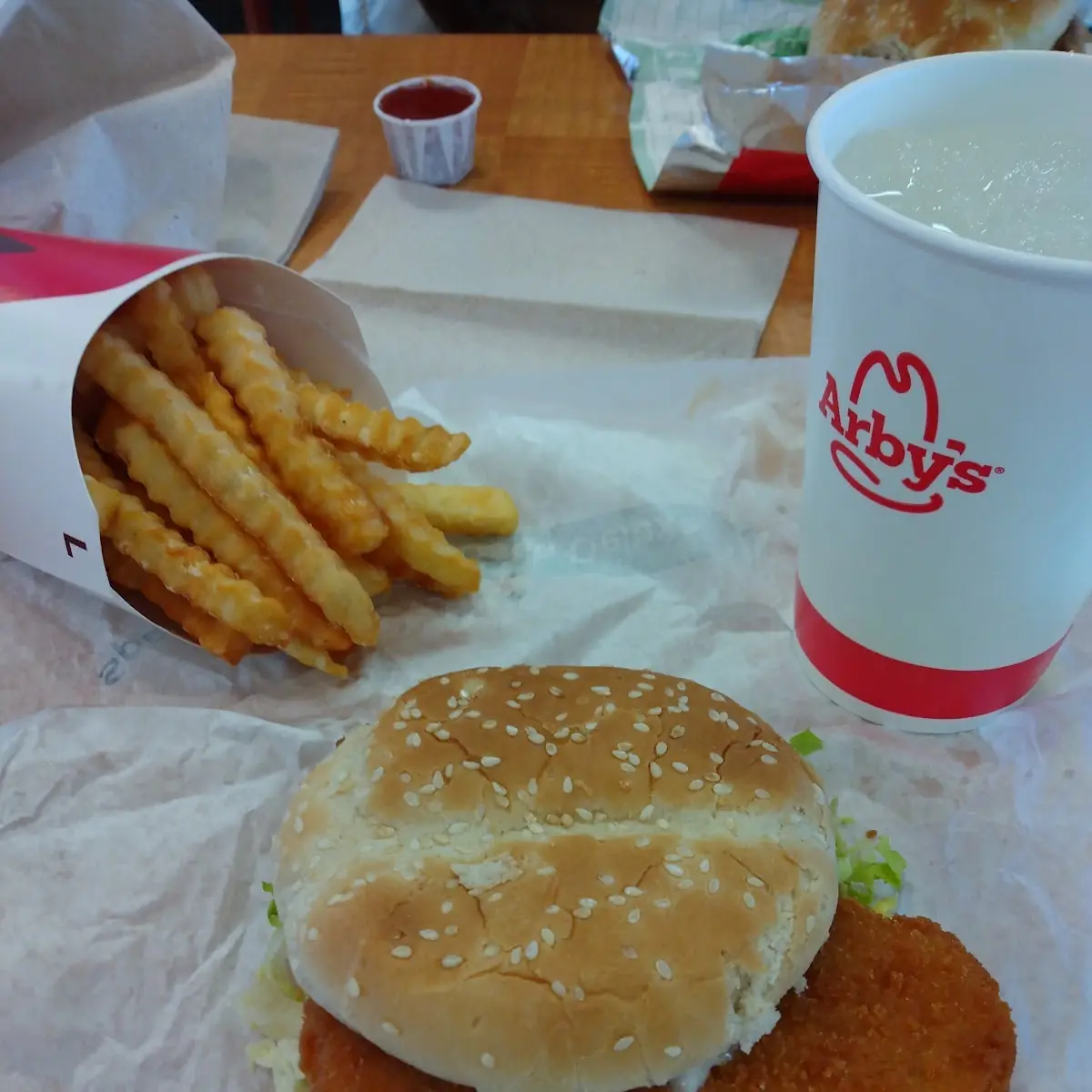 Arby's Crispy Fish Sandwich and Crinkle Cut Fries