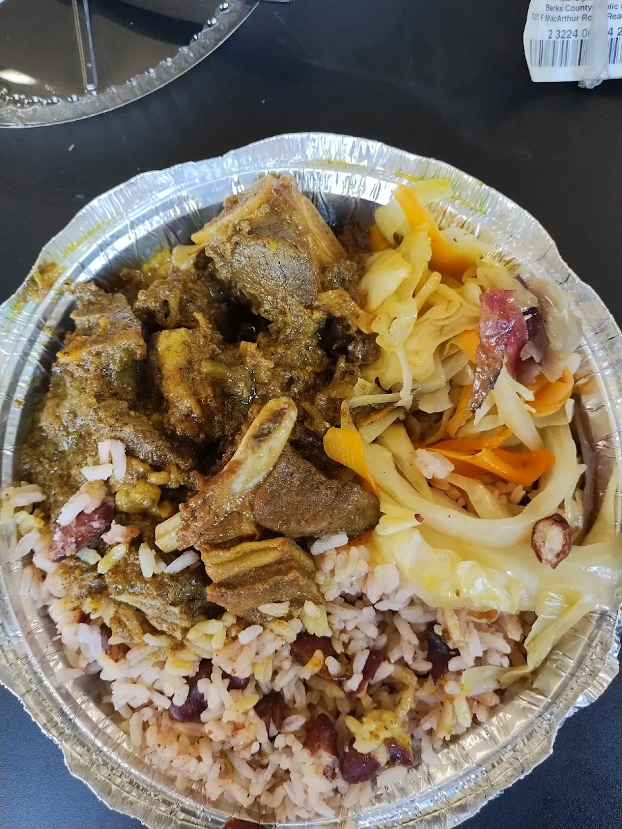 Curry Goat Rice and Peas and Cabbage