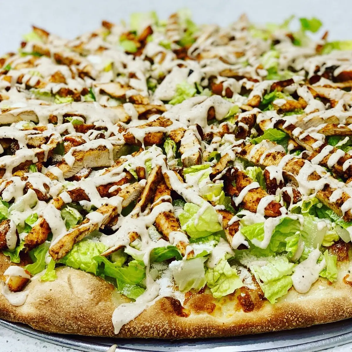 Grilled Chicken Caesar Pizza with Romaine Lettuce Croutons Grilled Chicken and Caesar Dressing