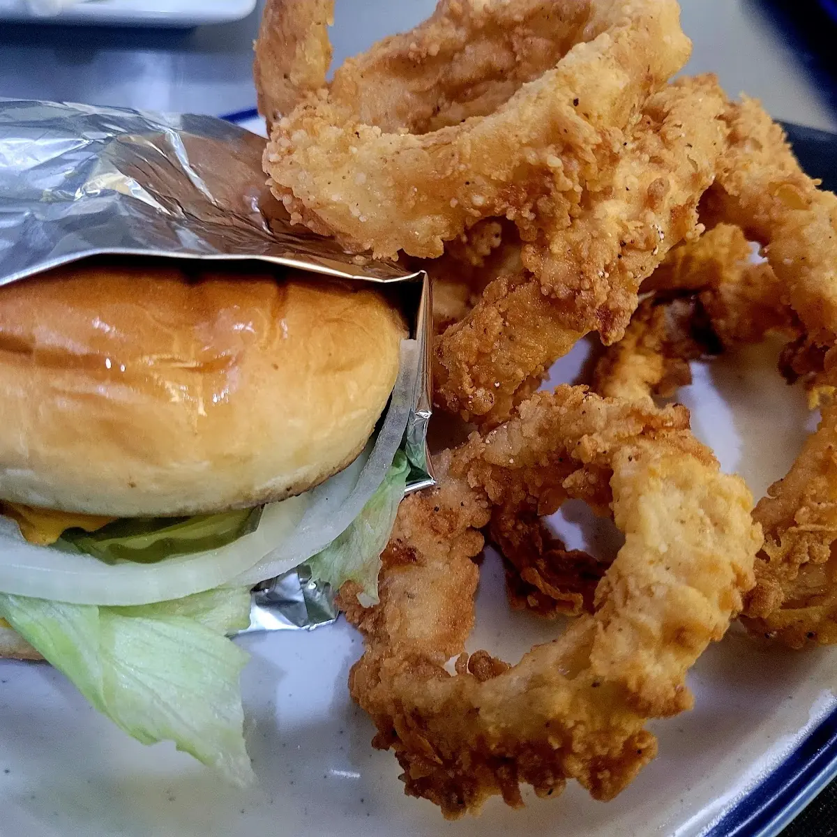 Basket Full of Hand Breaded Onion Rings