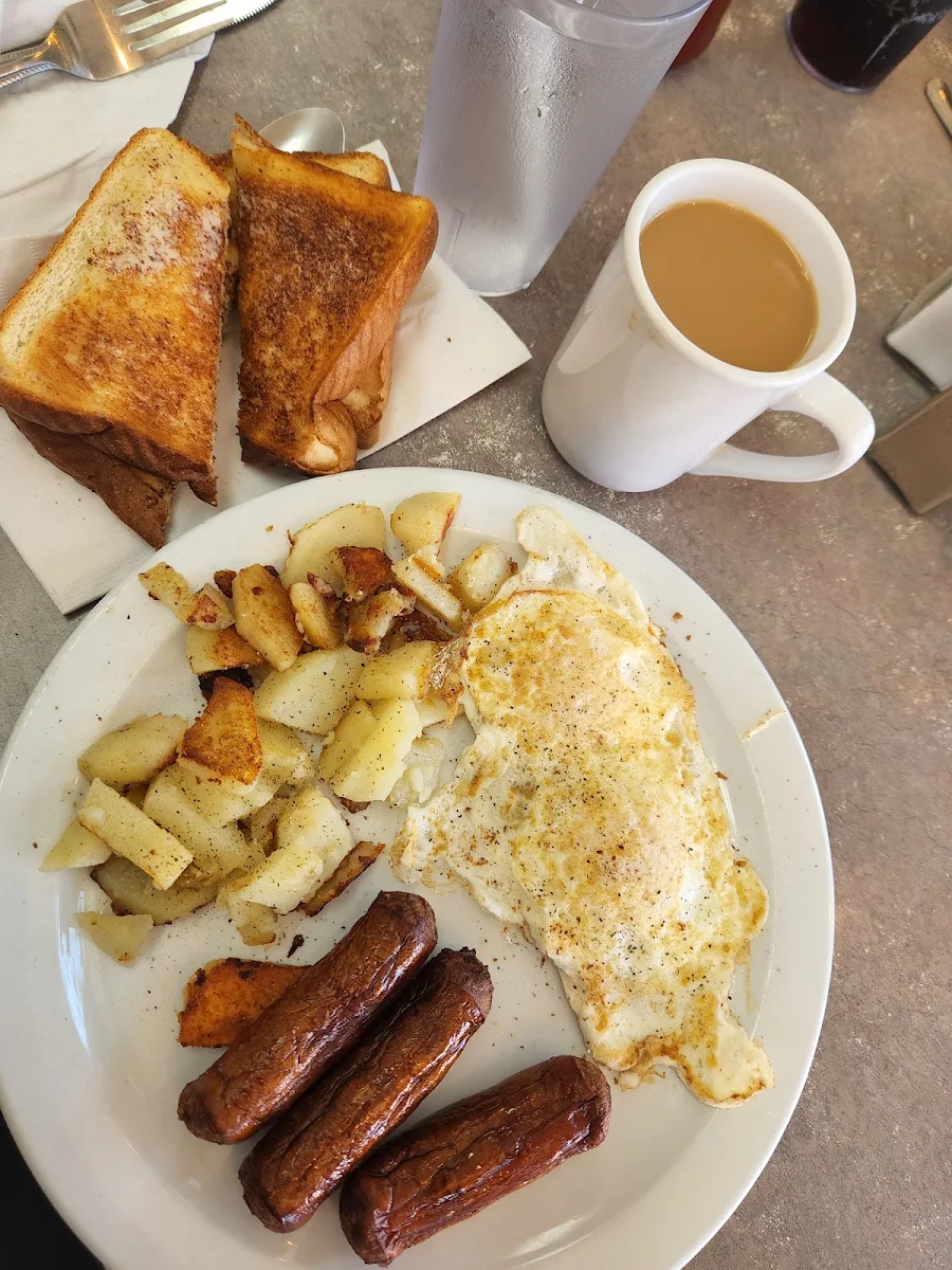 Sauage over Easy Eggs with with Toast, Amiro's Steak House