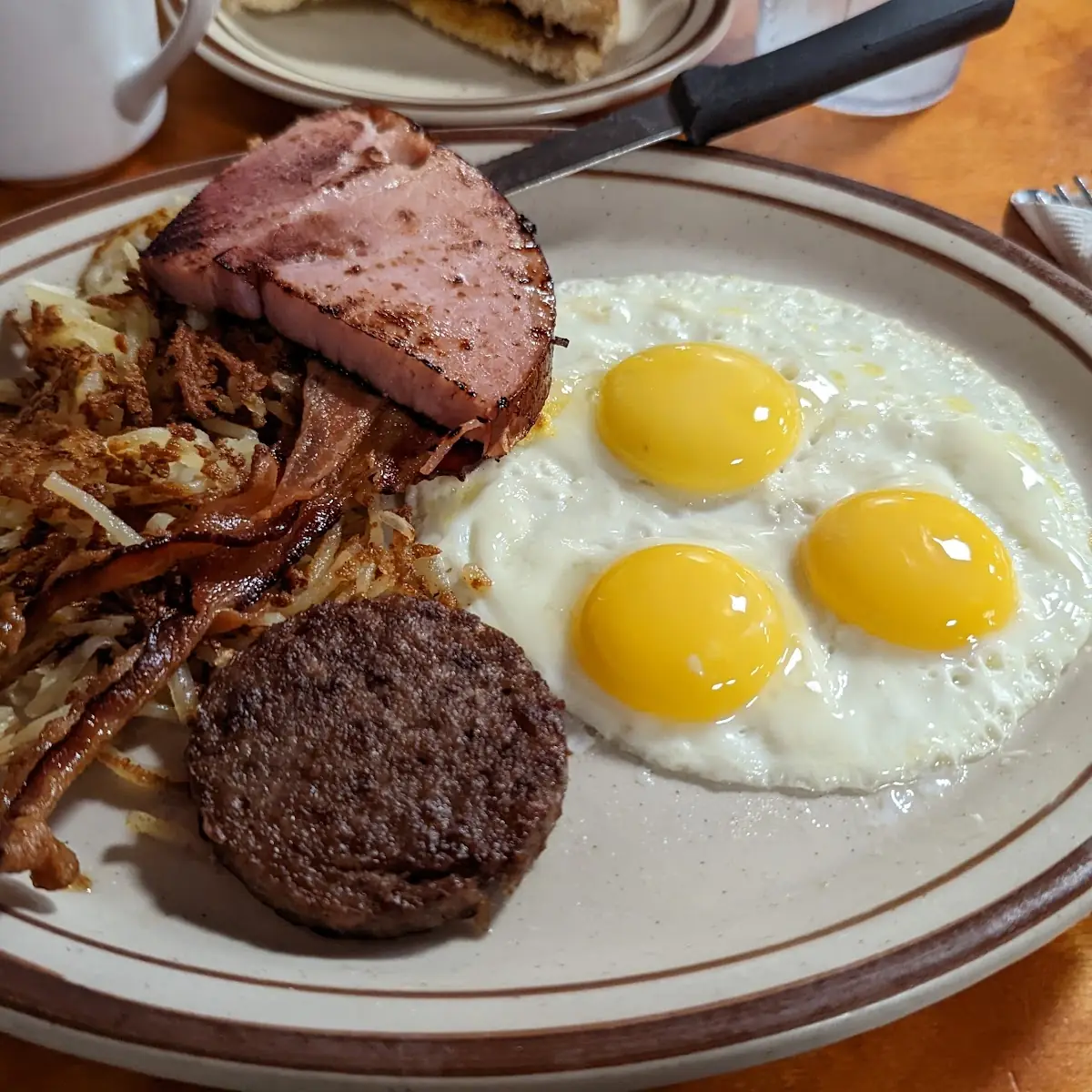 Biscuits with Sausage Gravy Hash Browns Fried Eggs