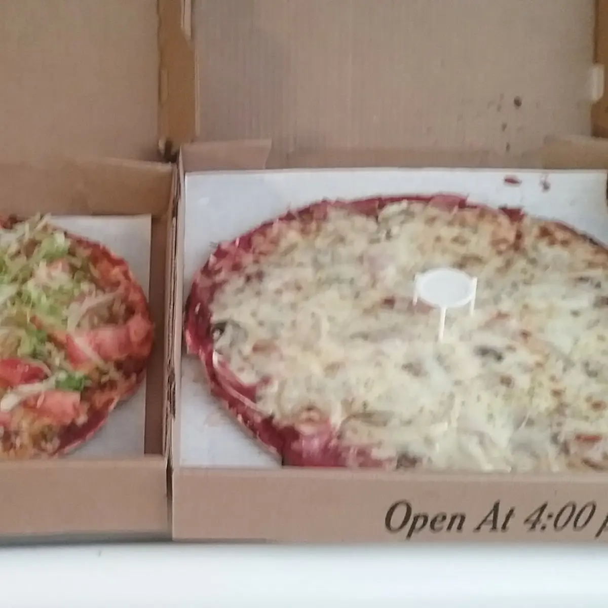Taco Pizza Plus a Ham Mushroom Onion Pizza