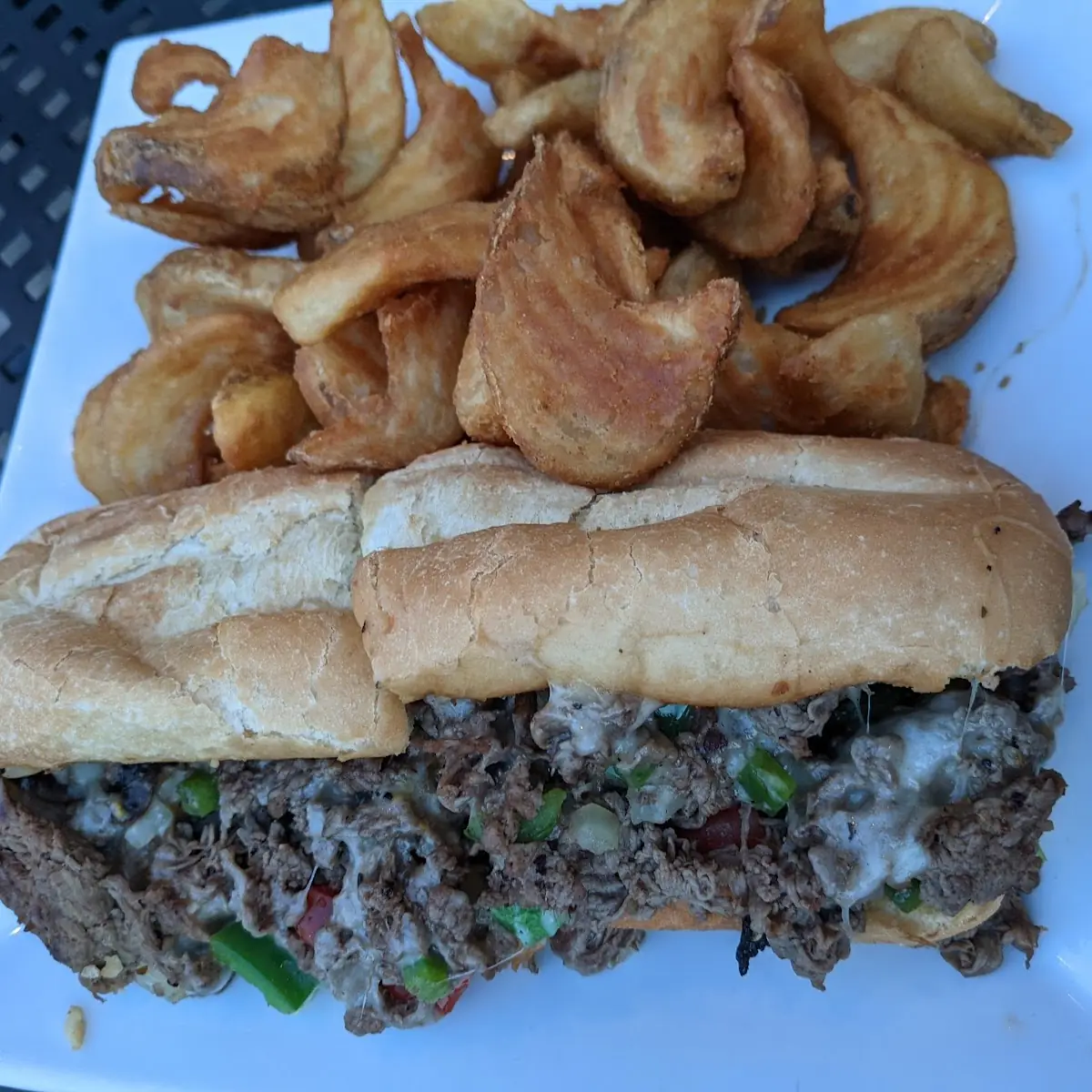 Silk's Cheese Steak or Chicken Cheese Steak