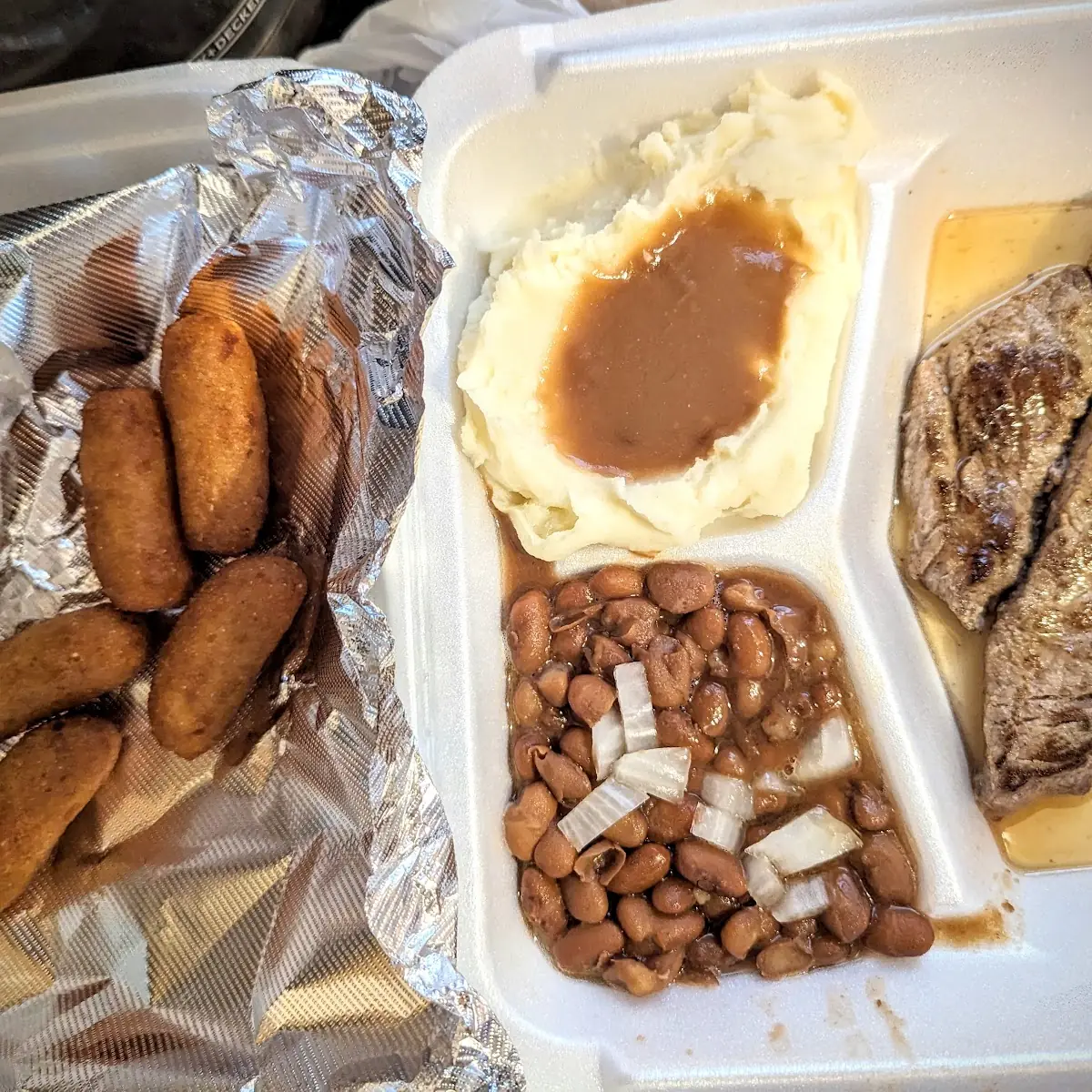 Beef Strips with Mashed Potatoes and Gravy and Pinto Beans