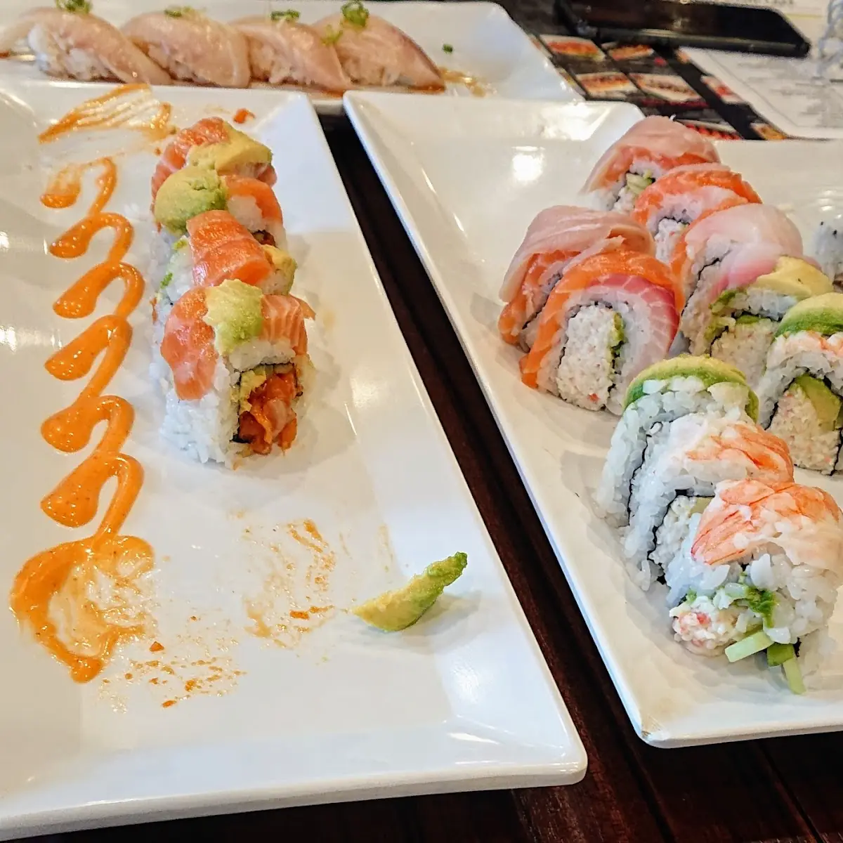Spicy Salmon Roll L Rainbow Roll R Yellow Tail Roll Back