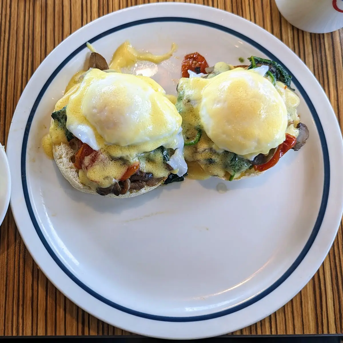 Egg Benedict with Pesto and Fruit Salad