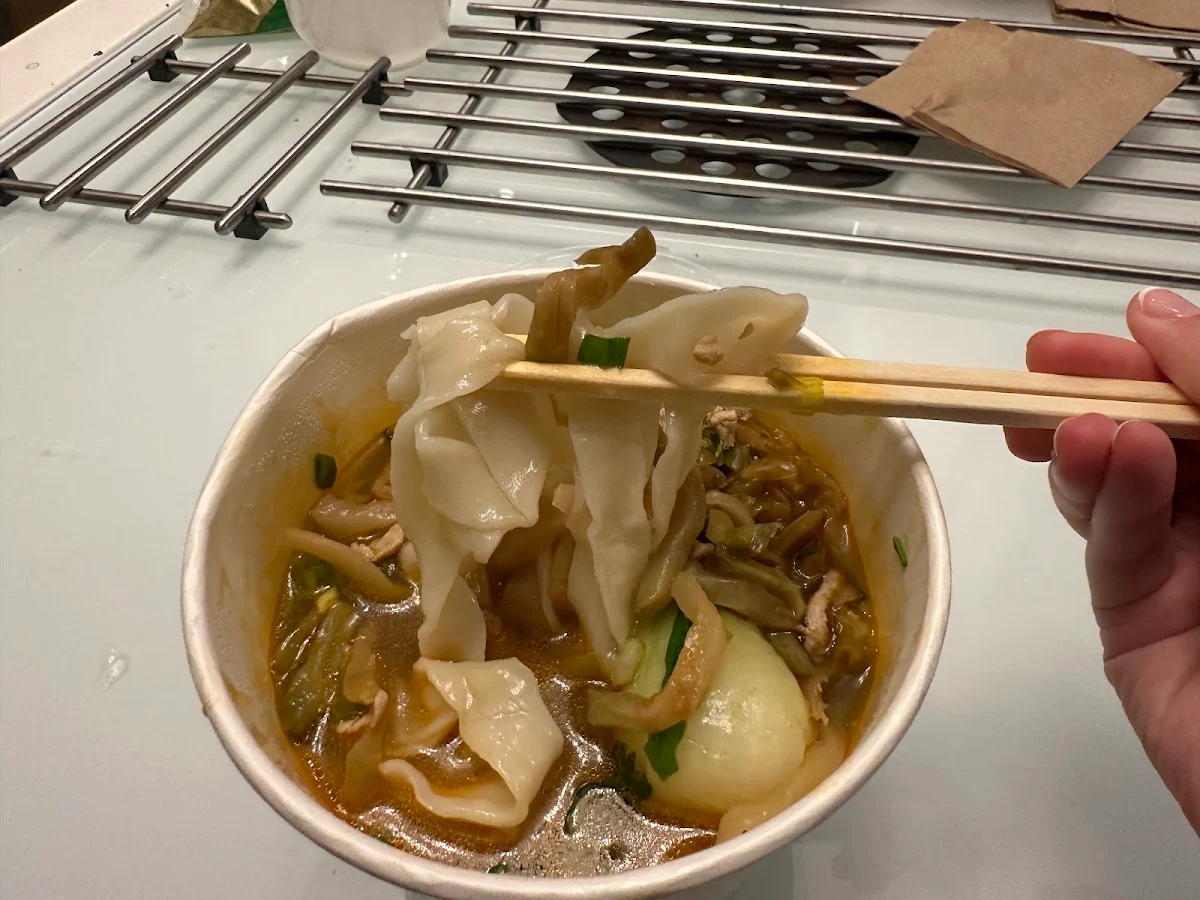 Preserved Radish and Shredded Pork with Noodle in Clear Beef Soup