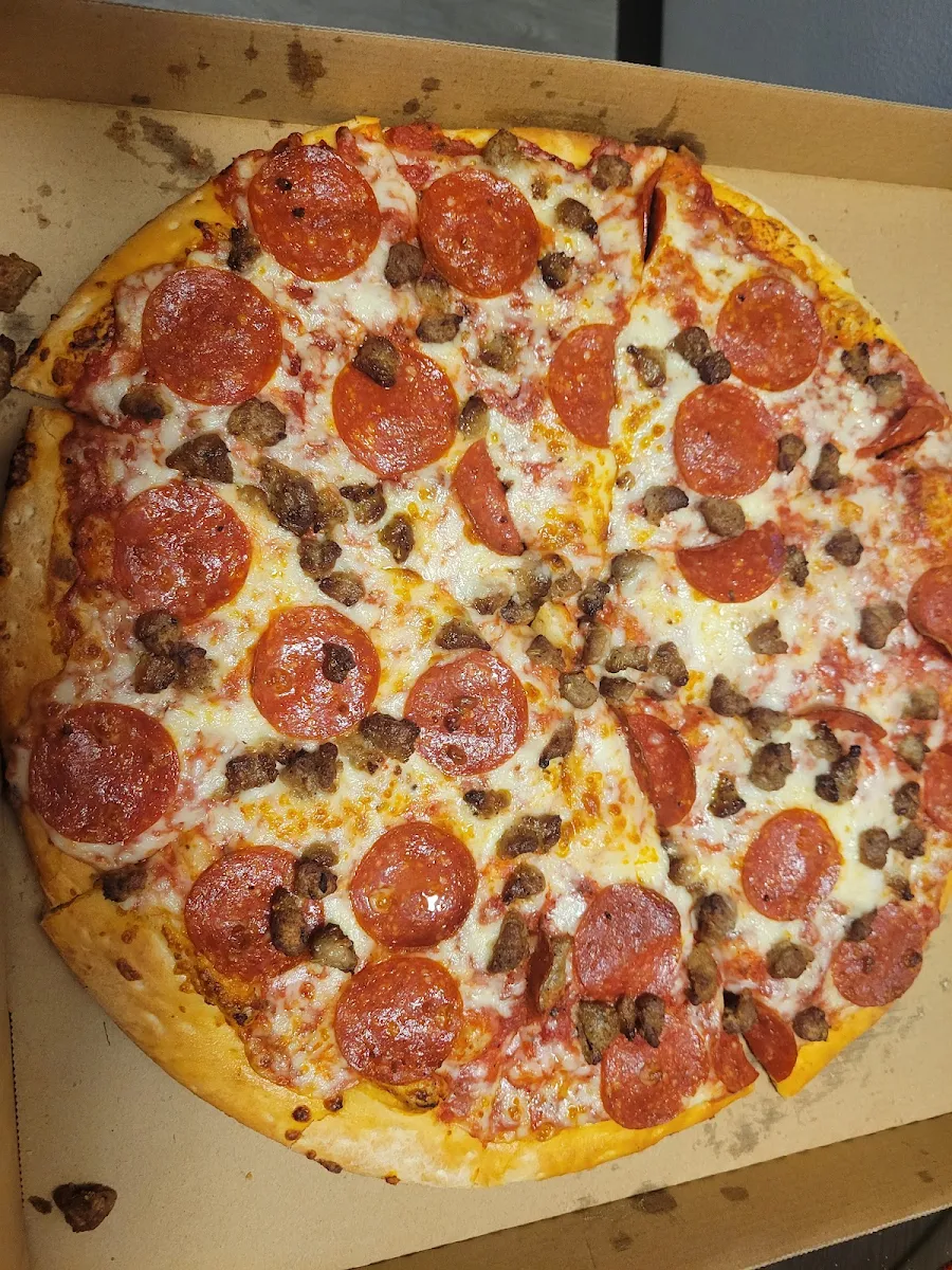 A Large Pepperoni and Sausage Pizza