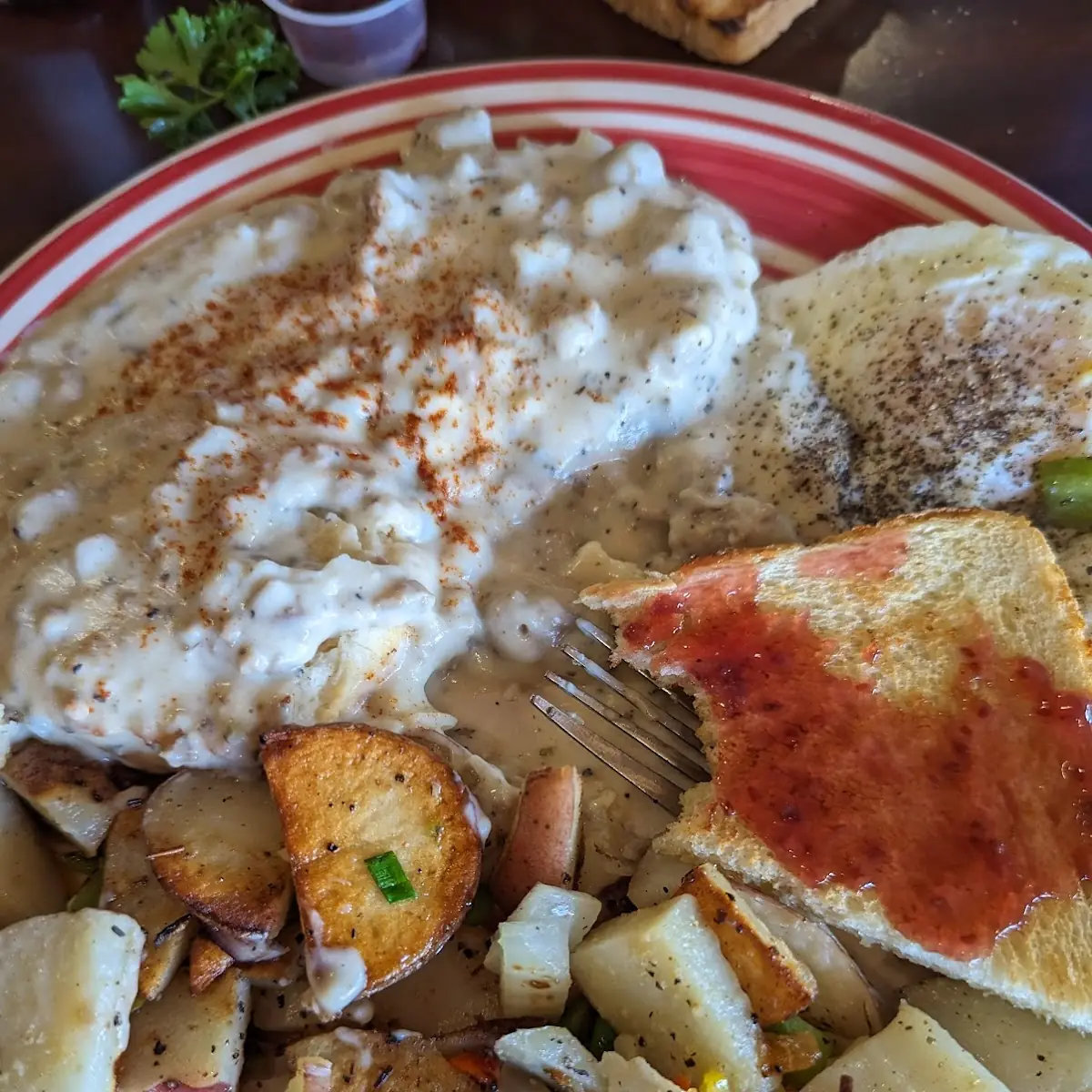 Biscuits Gravy Potato and Eggs