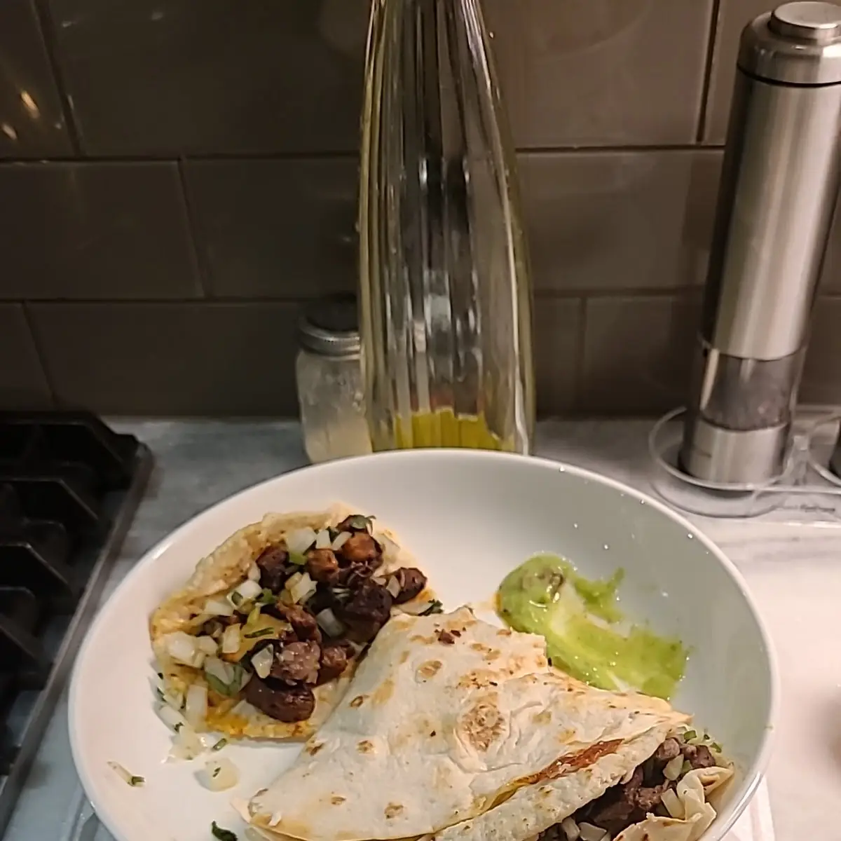 Cachete and Al Pastor Tacos & Beef Enchilada