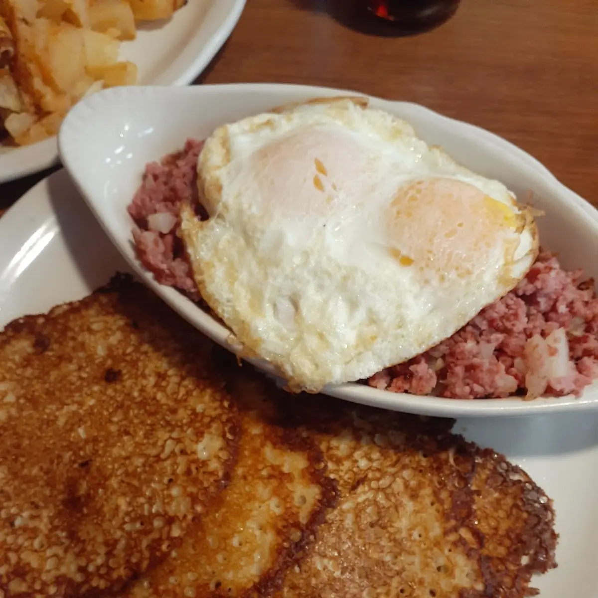 Fresh Corn Beef Hash and Eggs with Potato Cakes