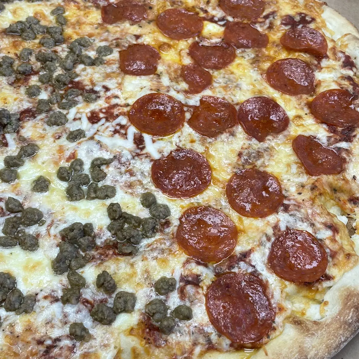 Half Pepperoni Half Sausage Pizza