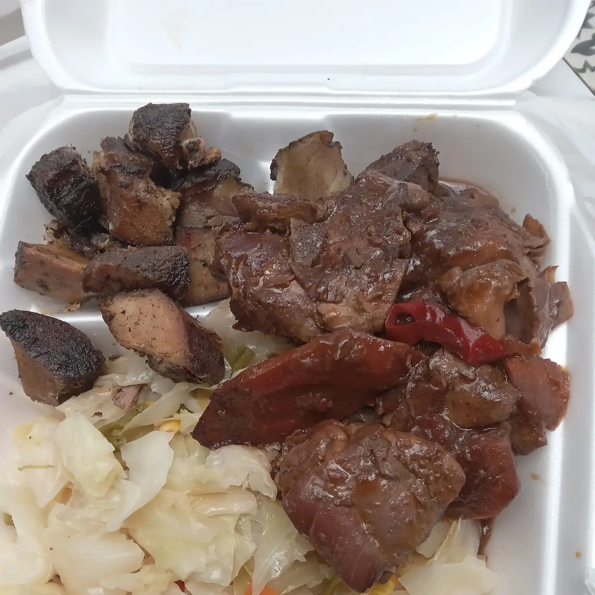 Jerk Pork Brown Stew Chicken and Cabbage