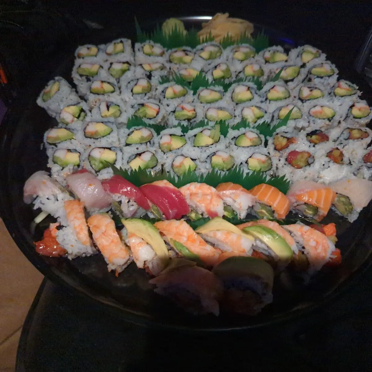 Sushi Platter with California Roll Rainbow Roll Shrimp Heart Roll Spicy Tuna Roll