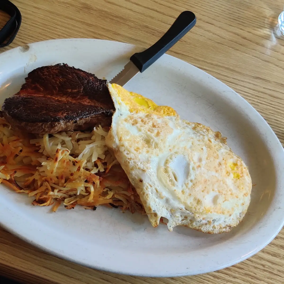 Steak and Hash Browns with Eggs over Easy