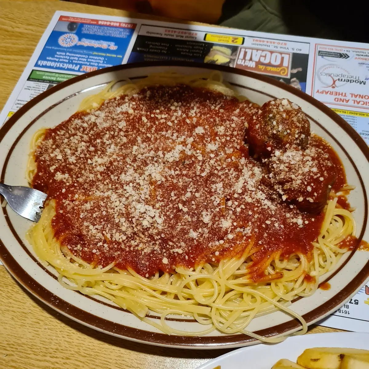 Chicken or Eggplant Parmigiana Served with Spaghetti