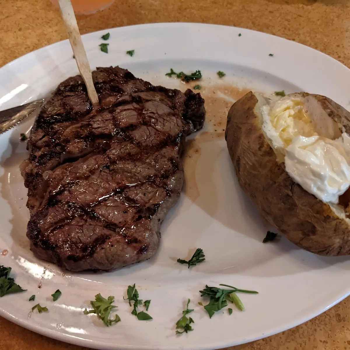 10 Oz Rib Eye with Baked Potato