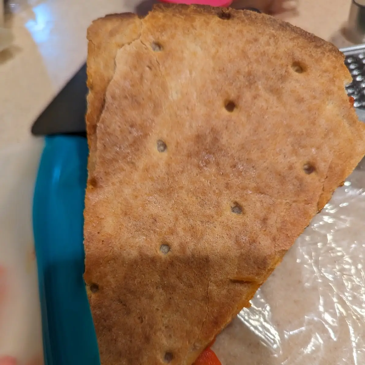 Bottom of a Thin Crust Pizza