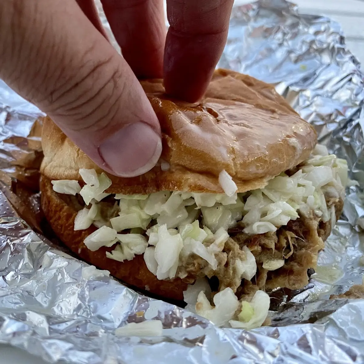 BBQ Pulled Pork Sandwich with Slaw and Hot Sauce