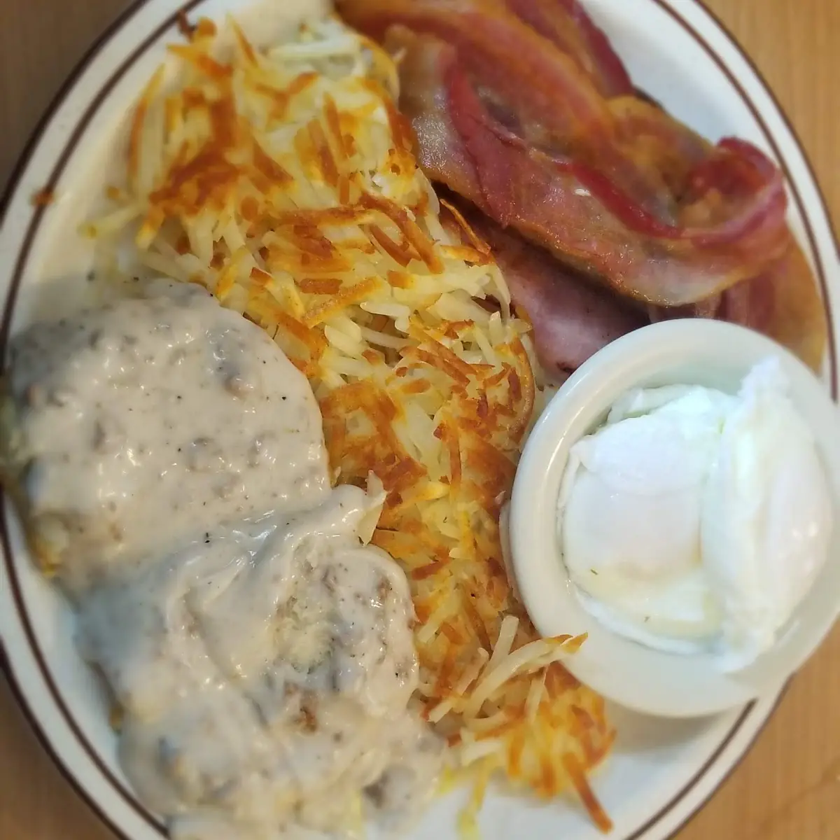 Biscuits and Sausage Gravy with Poached Egg