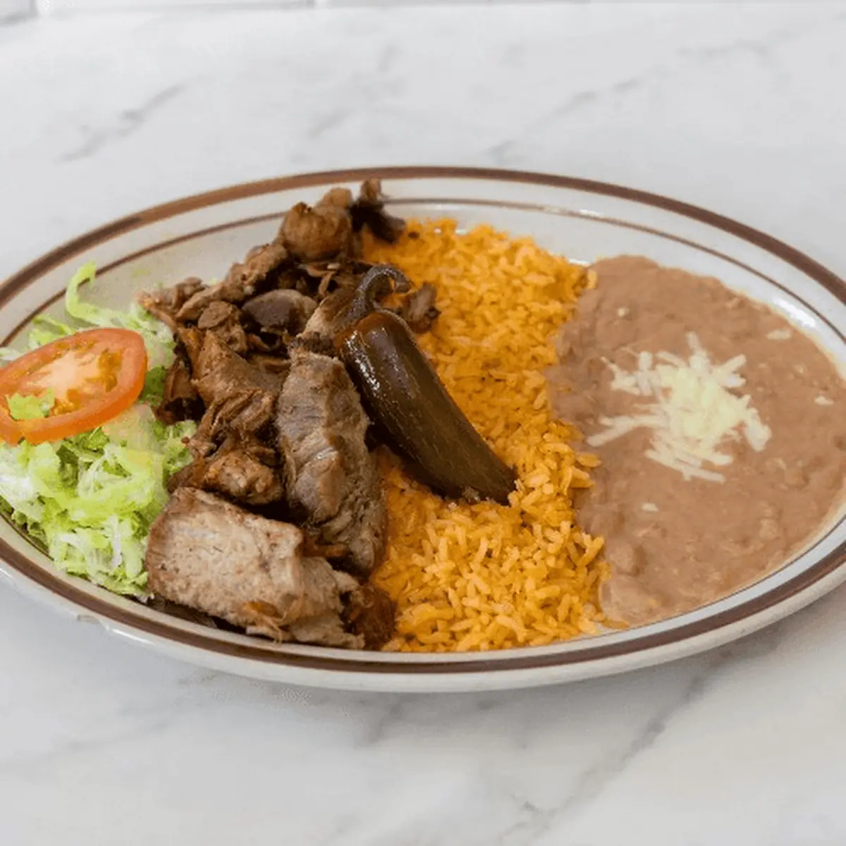 Three Beef Tacos Rice & Beans