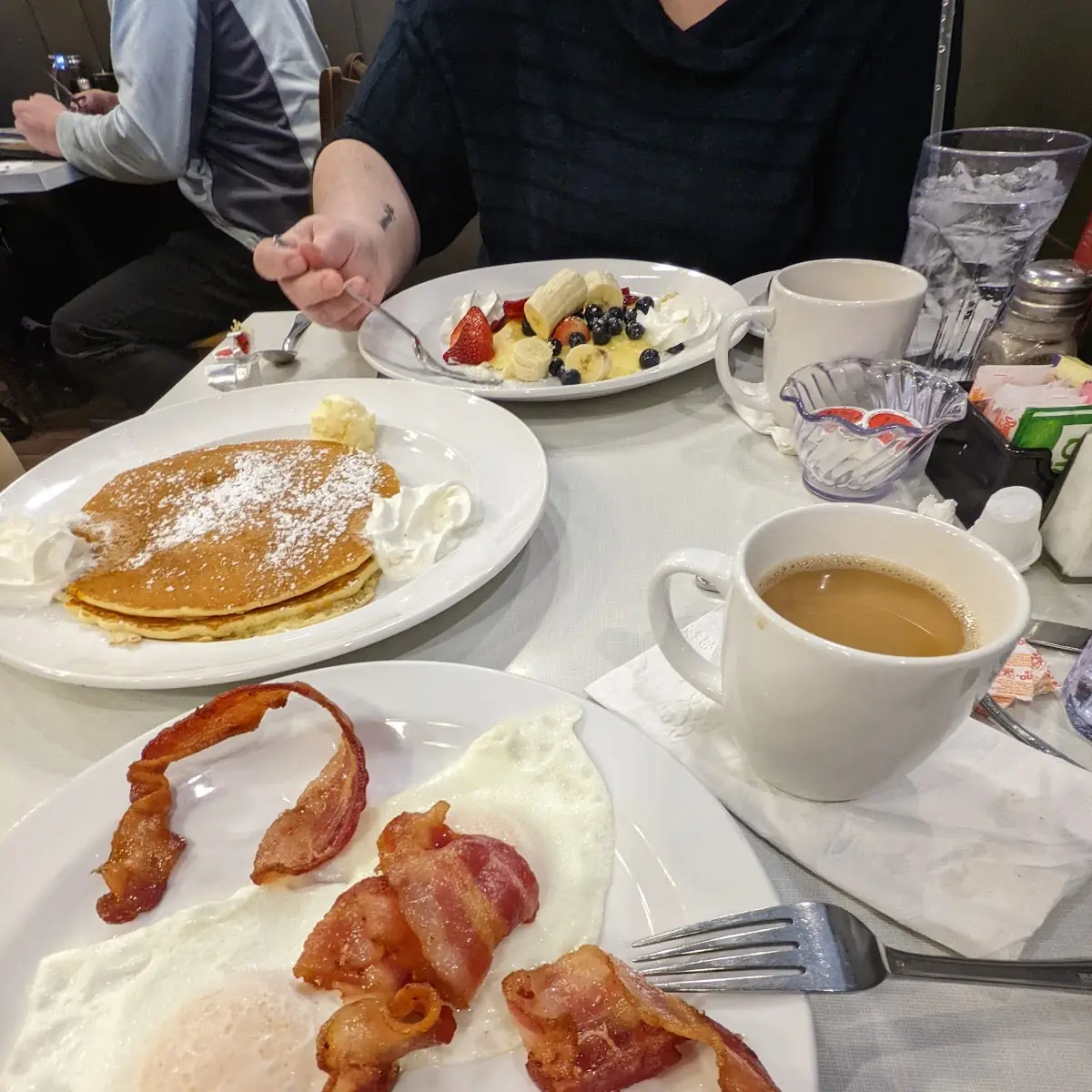 Short Stack of Pancakes with Bacon and Eggs