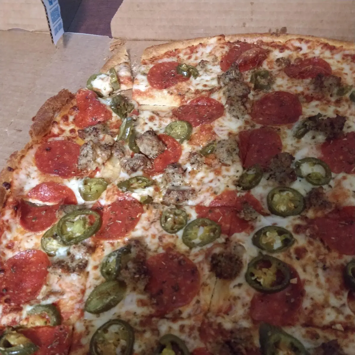 Thin Crust Pepperoni Italian Sausage and Jalapenos