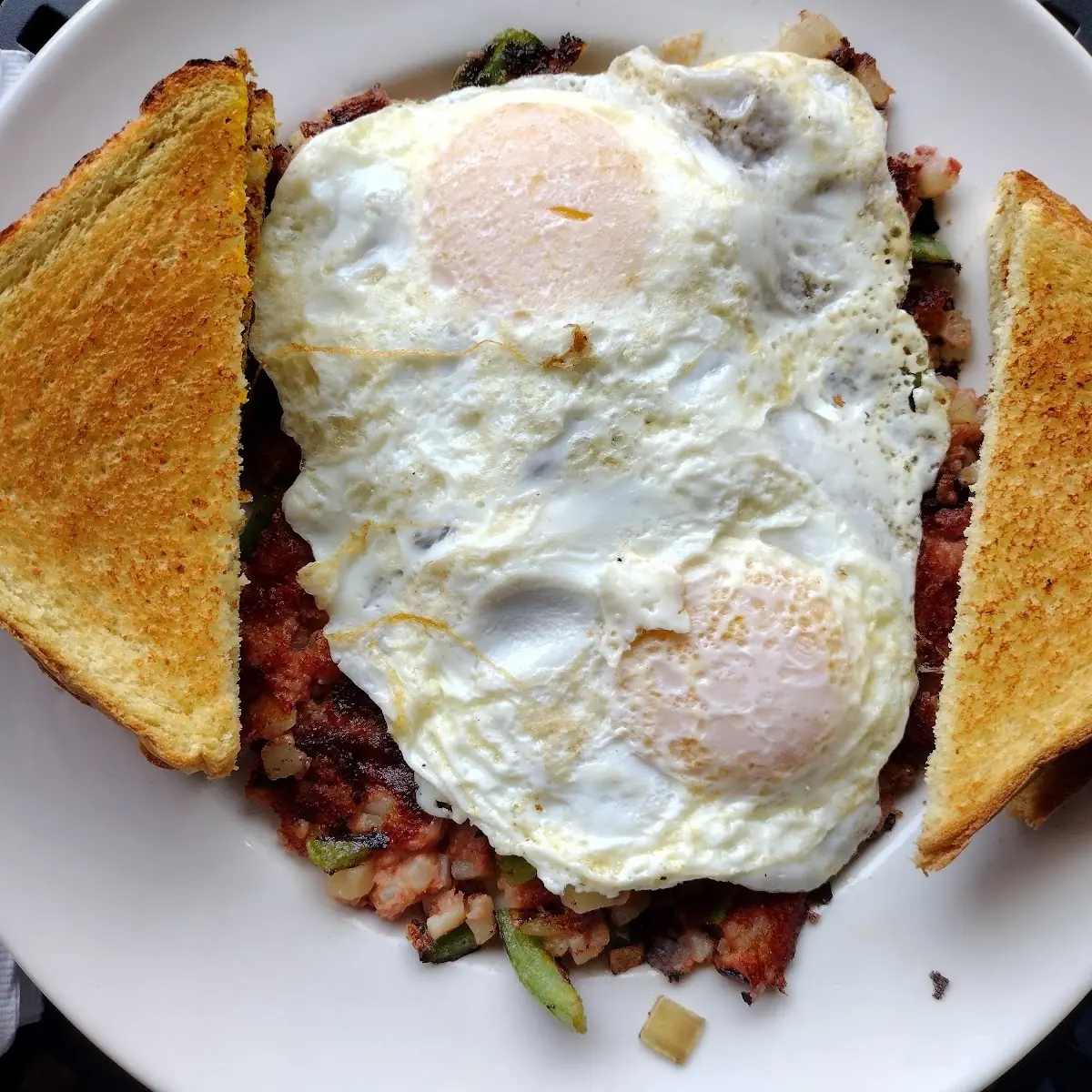Two Eggs Meat Potatoes Toast