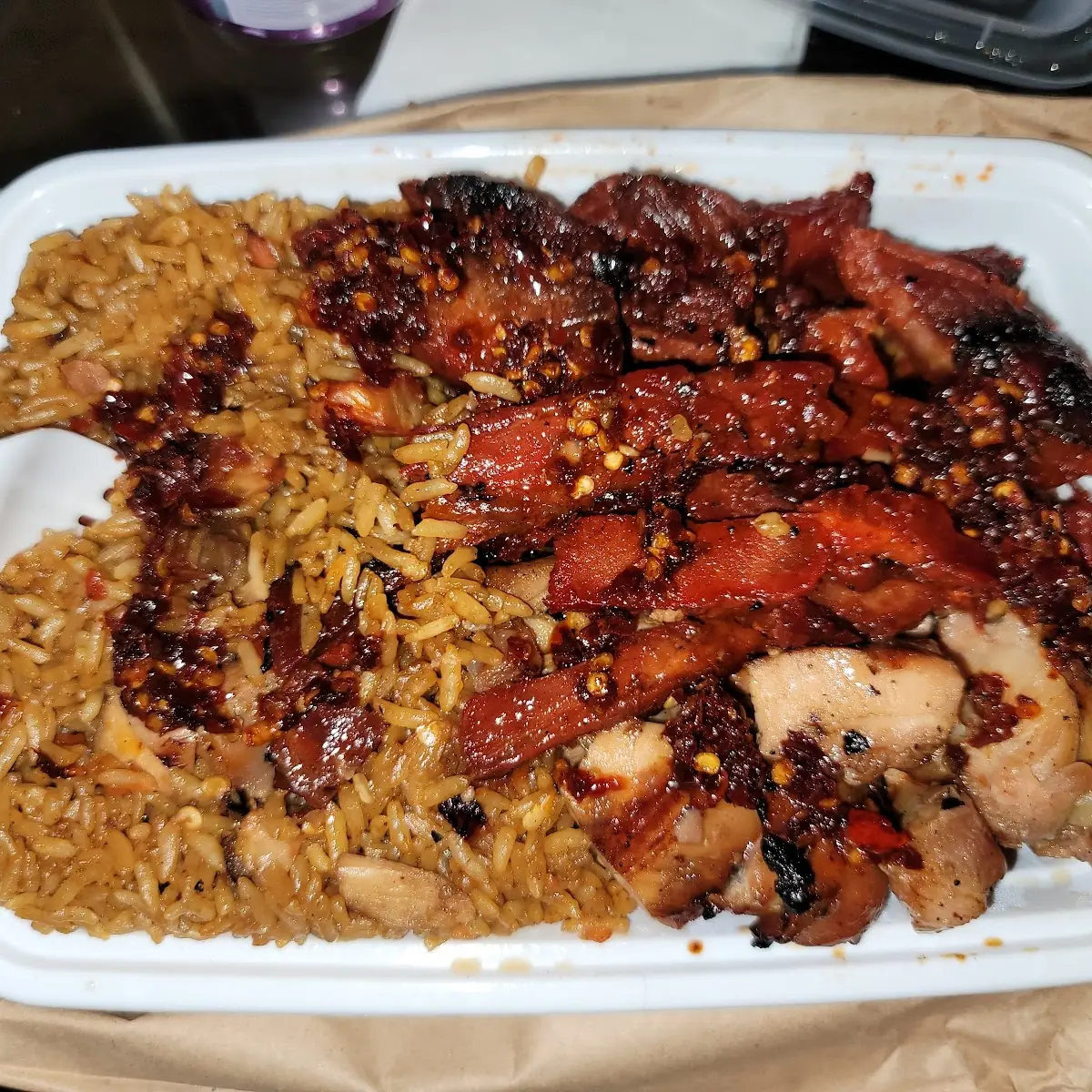 Bourbon Chicken with BBQ Spare Ribs over Pork Fried Rice