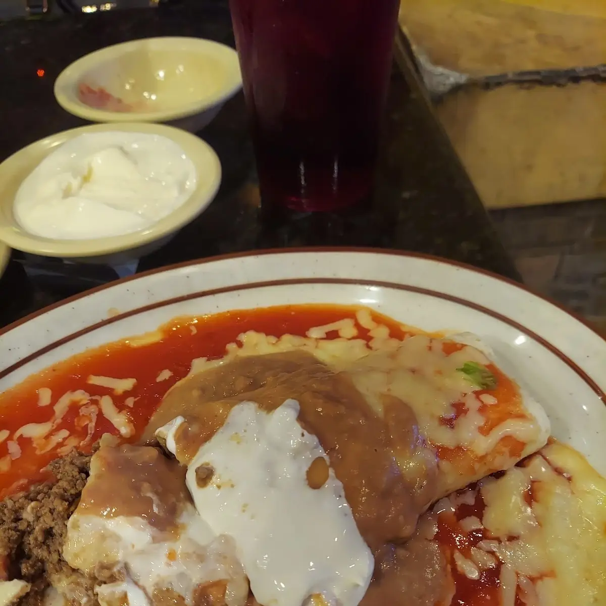 Beef Burrito Beans Sour Cream with Red Sauce