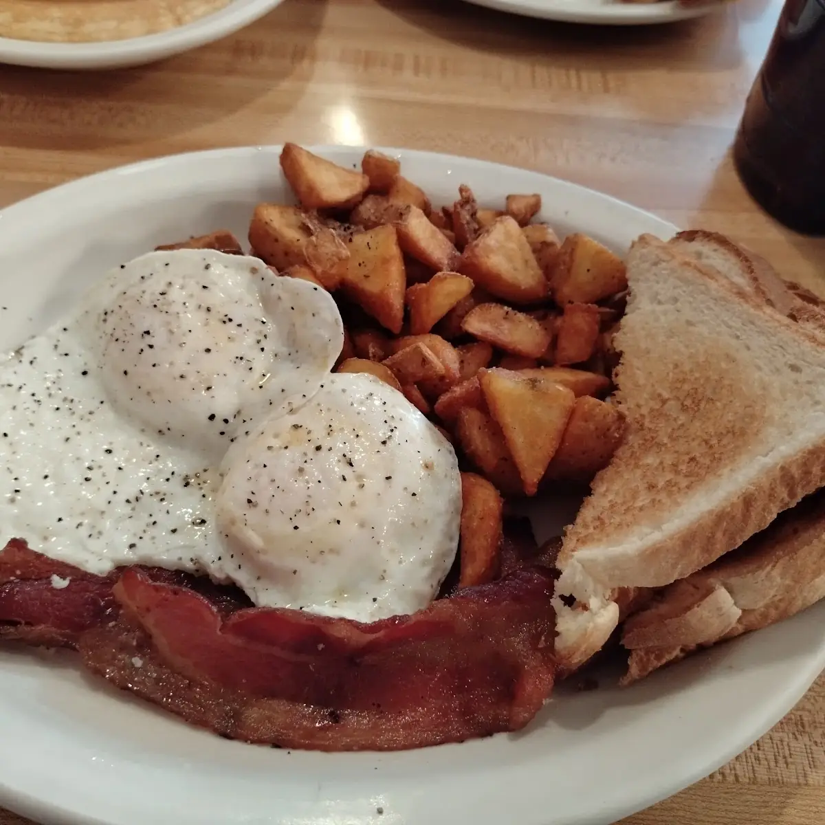 Two Eggs Bacon American Fries and Toast