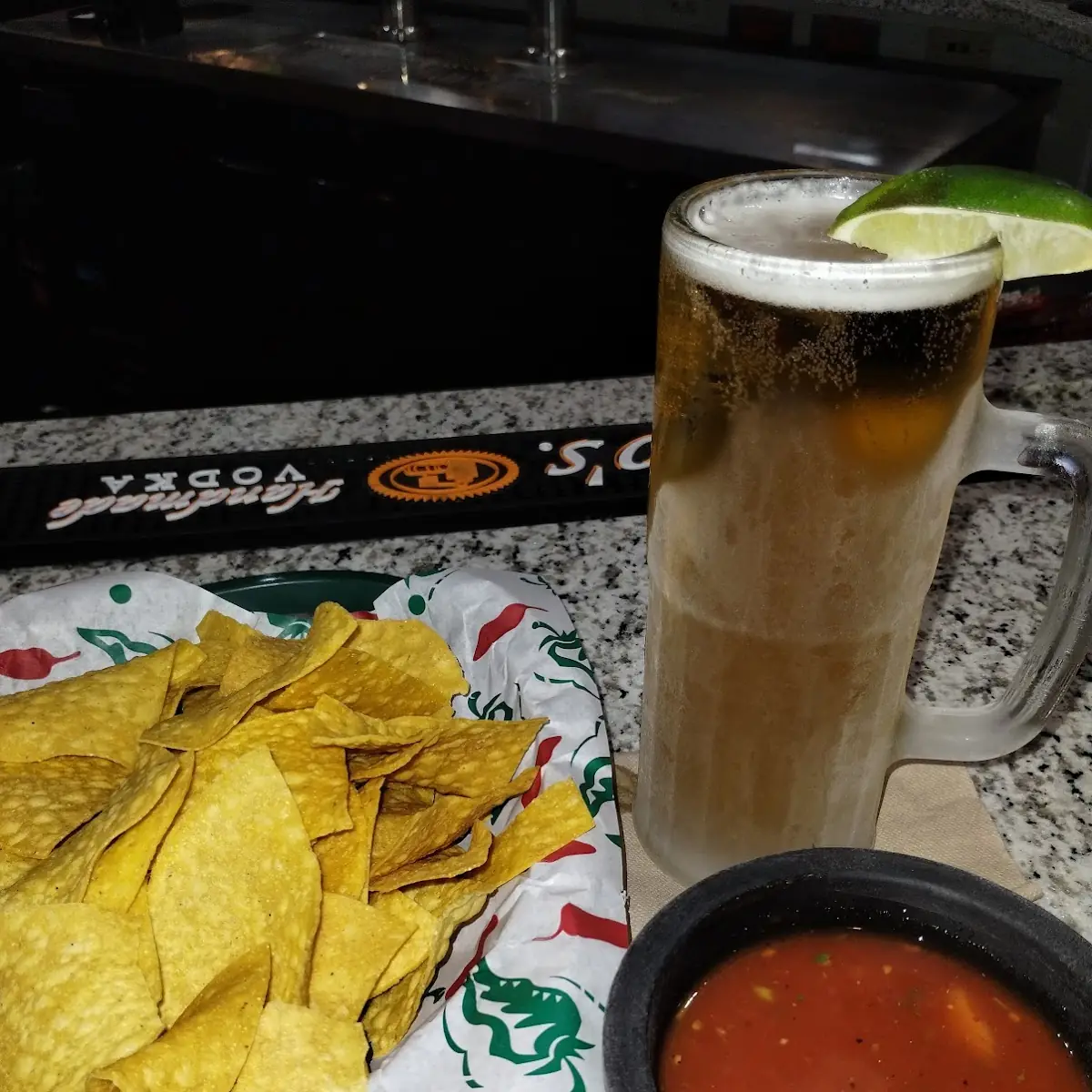 Chips Salsa Dip and Modelo on Draft