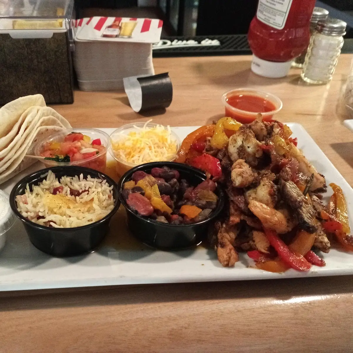 Chicken Beef and Shrimp Fajitas