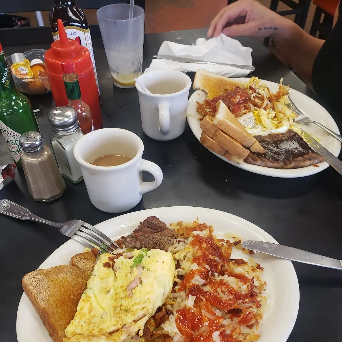 Three Egg Omelet Hash Browns and Toast