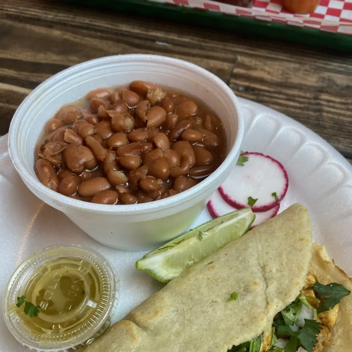 Side of Pinto Beans and S Chicken Soft Taco