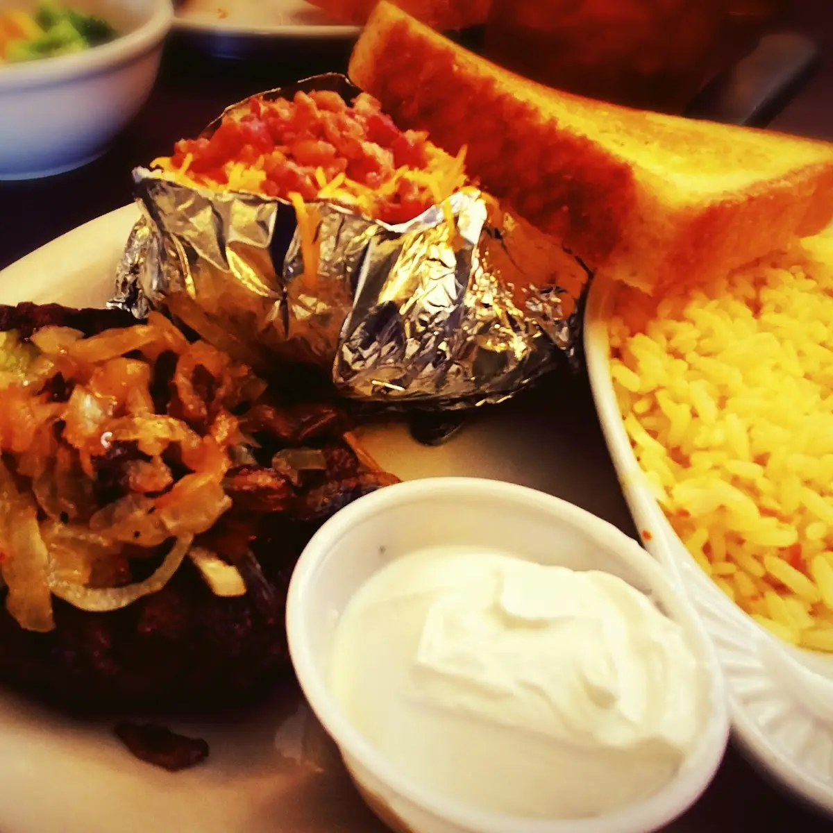 Chopped Steak with Baked Potato and Rice