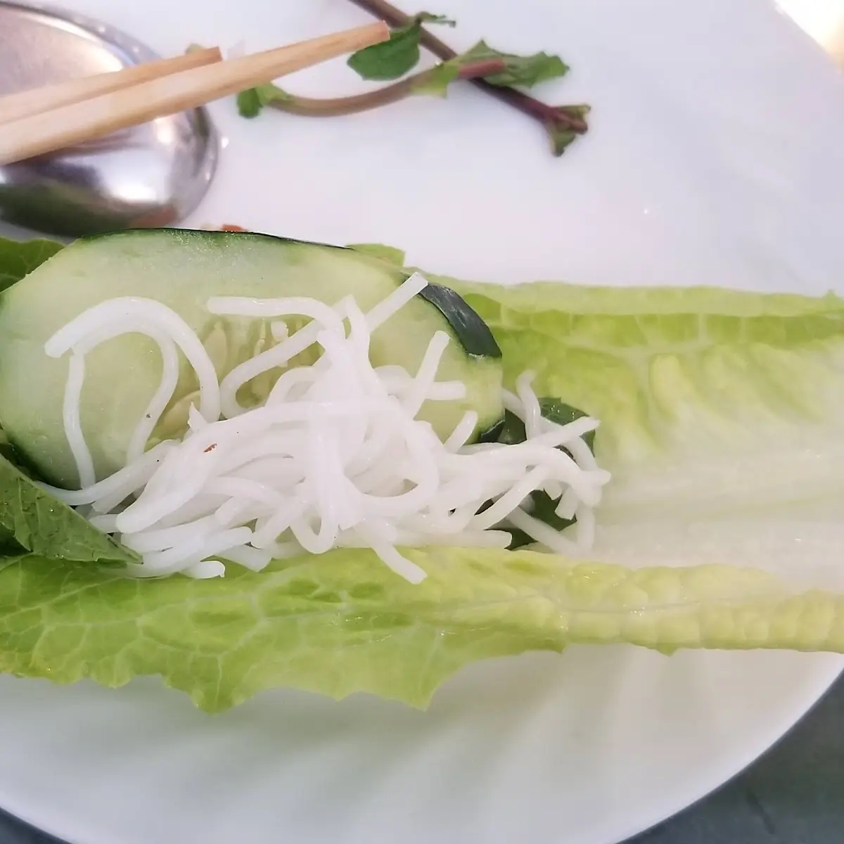 Wrapping Egg Rolls in Lettuce
