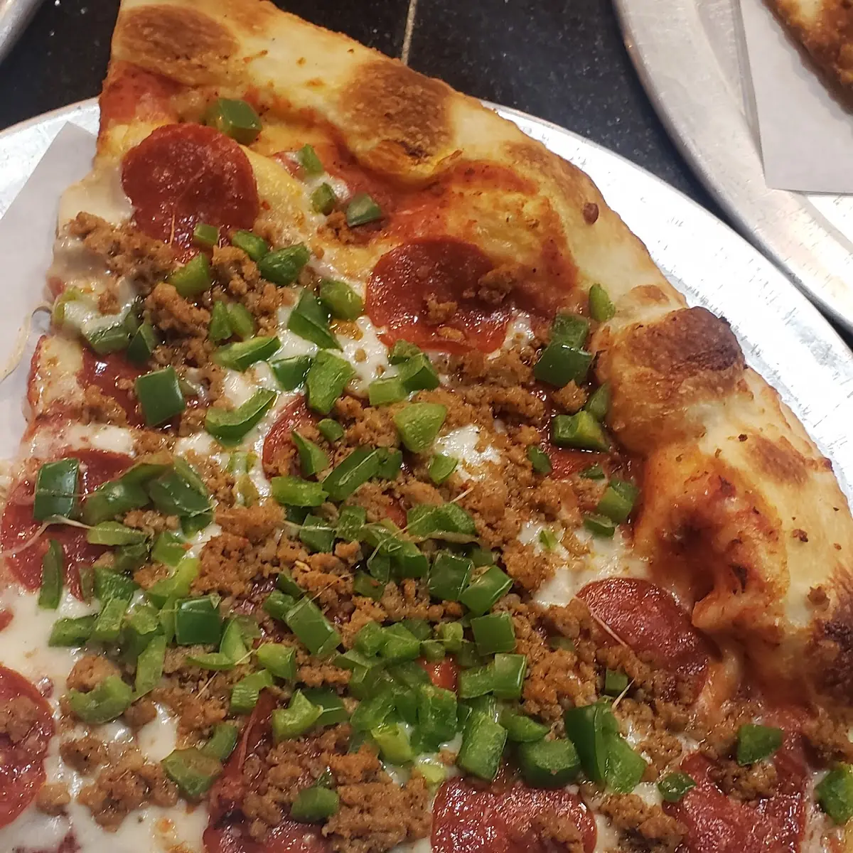 Sausage and Peppers with Pepperoni Pizza Slice