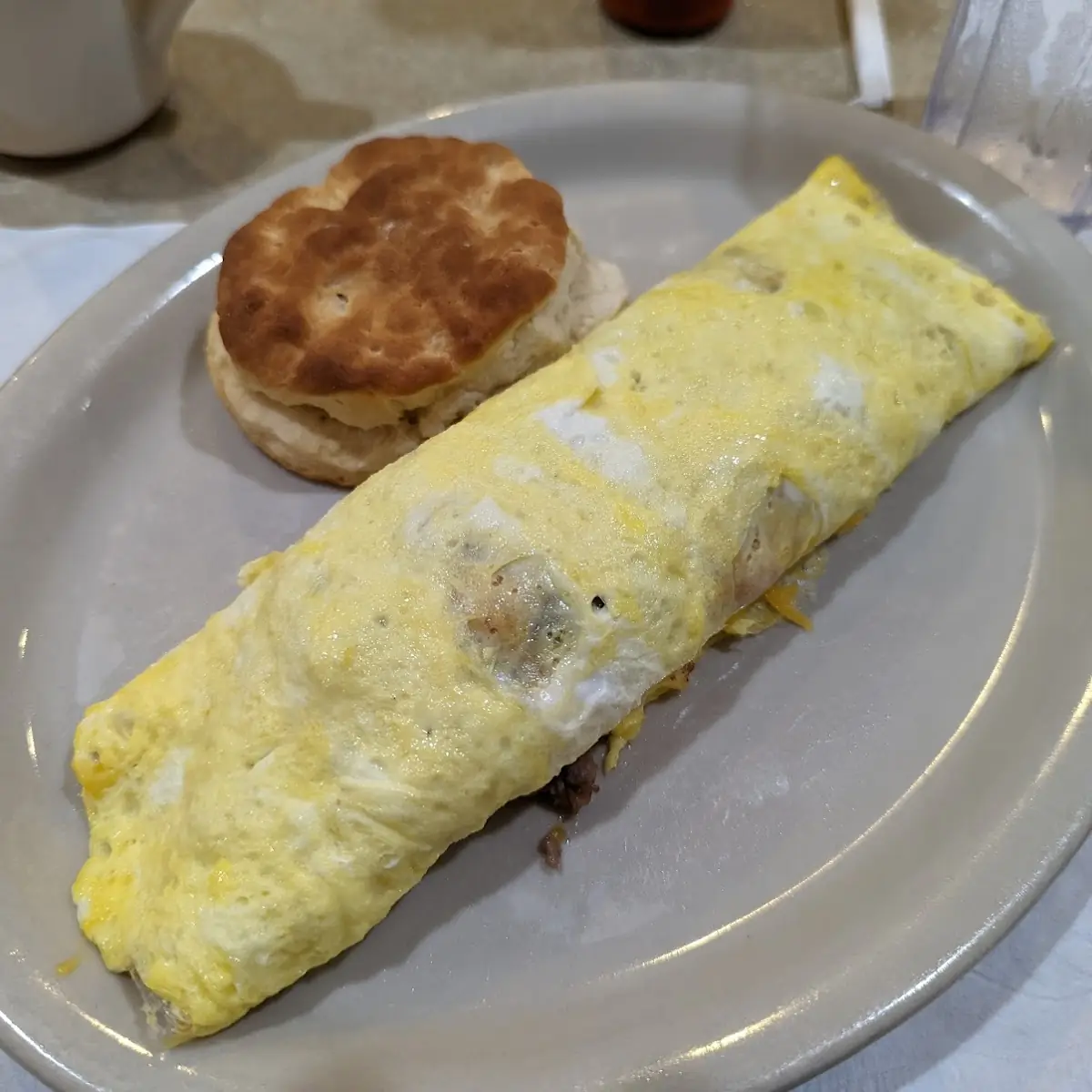 Meat Lovers Delight Omelette and Biscuit