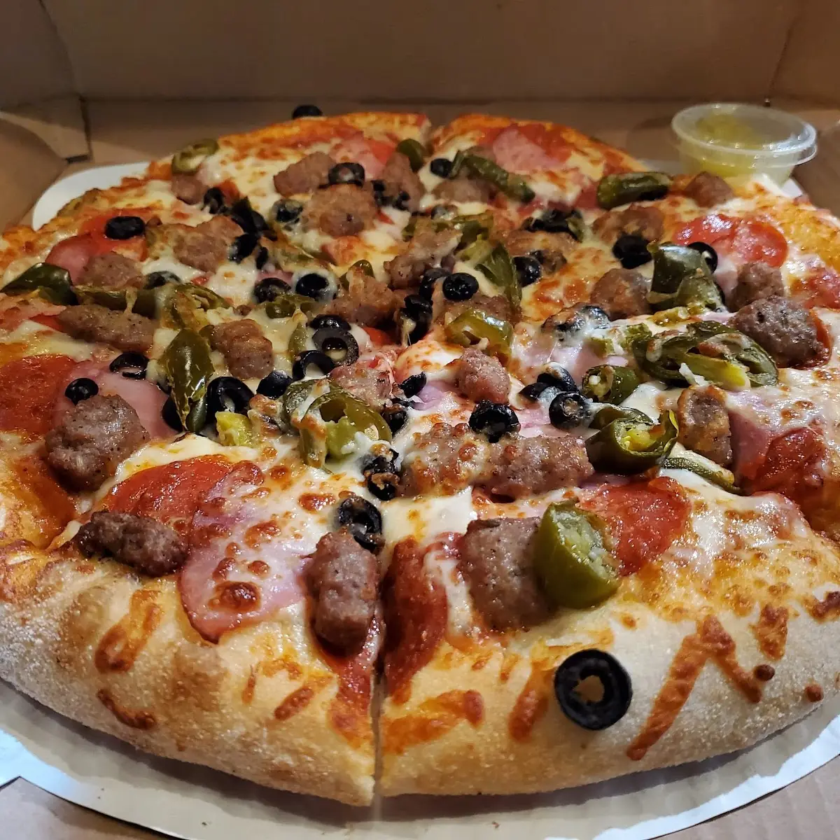 Meat Pizza with Jalapenos and Black Olives