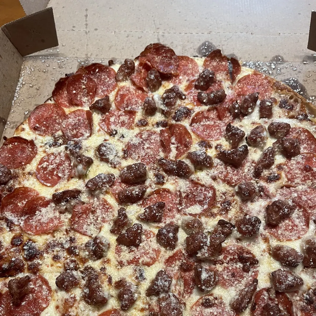 Sausage & Pepperoni with Garlic Parmesan over the Pie