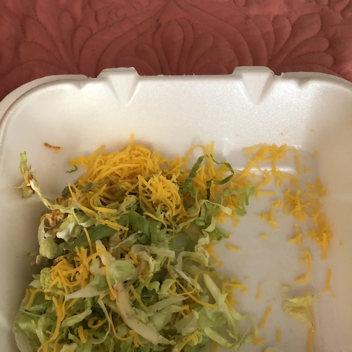Tostada with Sour Cream and Tomatoes Added