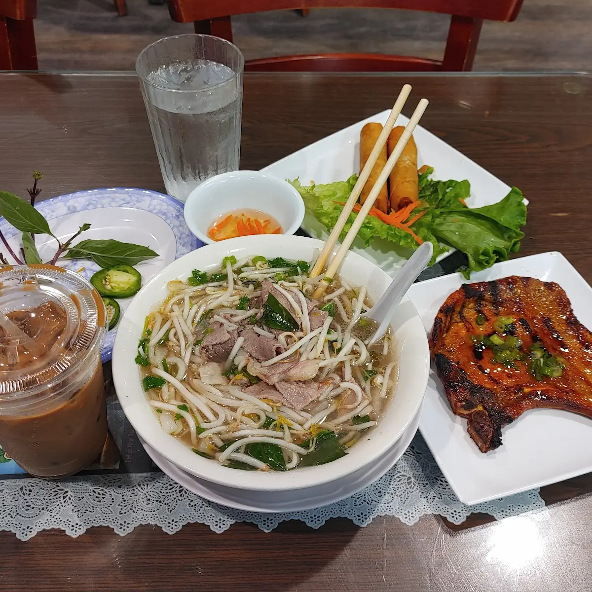 Beef Pho Café Sua Da Grilled Pork Chop and Egg Rolls