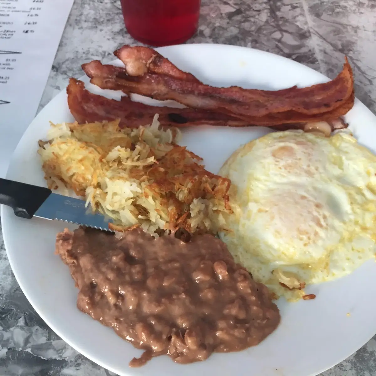 Two Eggs Any Style Hash Browns and Toast