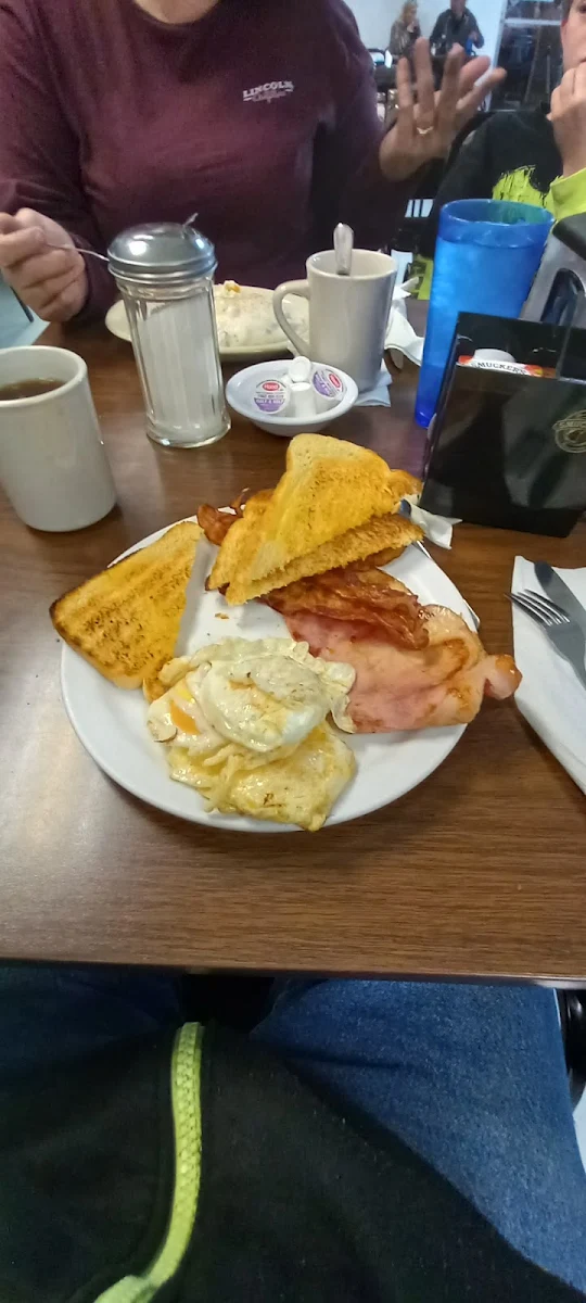 Ham and Bacon over Easy Egg with White Toast