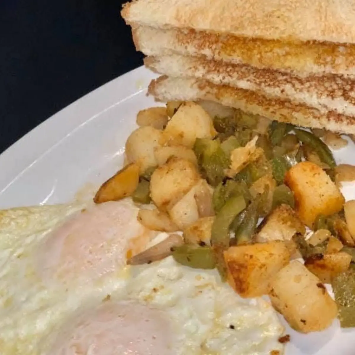 Two Eggs Home Fried Potatoes and Toast