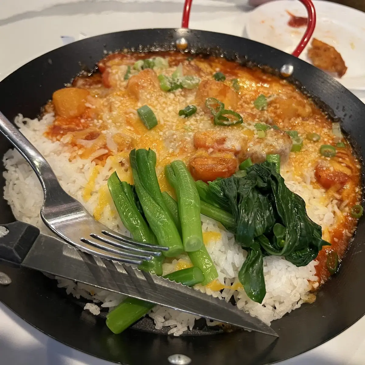 Pork Chop Gratin with Pineapple Tomato Sauce